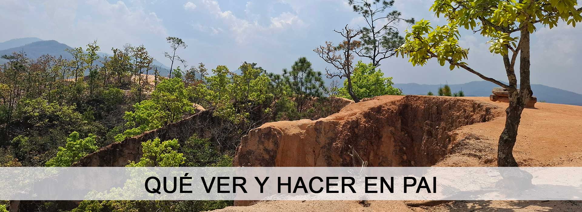 Vista del Cañón de Pai con vegetación y vegetación boscosa en Tailandia, con el texto superpuesto Qué ver y hacer en Pai.